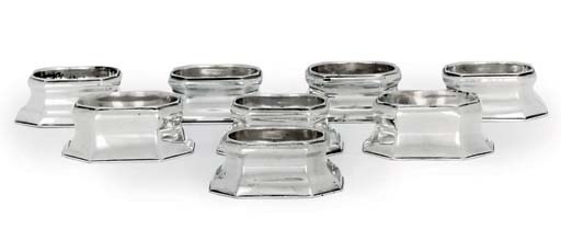 FOUR PAIRS OF QUEEN ANNE, GEORGE I AND GEORGE II SILVER TRENCHER-SALTS