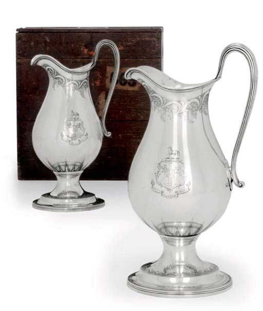 A PAIR OF GEORGE III SILVER JUGS