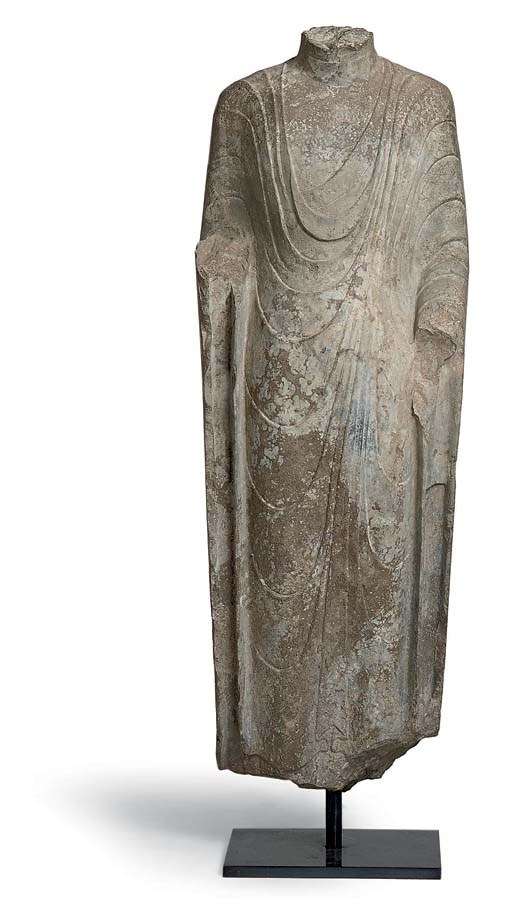 A LARGE CHINESE GREY LIMESTONE TORSO OF BUDDHA