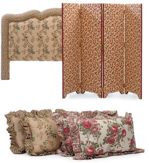 A YELLOW AND RED-FLORAL COTTON THREE-FOLD LOW SCREEN AND A SIMILARY UPHOLSTERED HEADBOARD