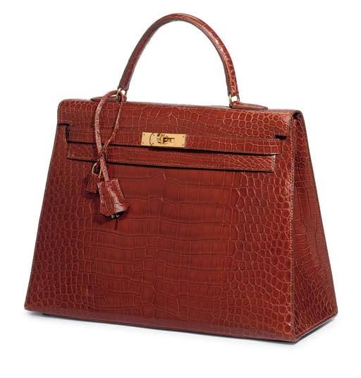 A COGNAC CROCODILE KELLY BAG