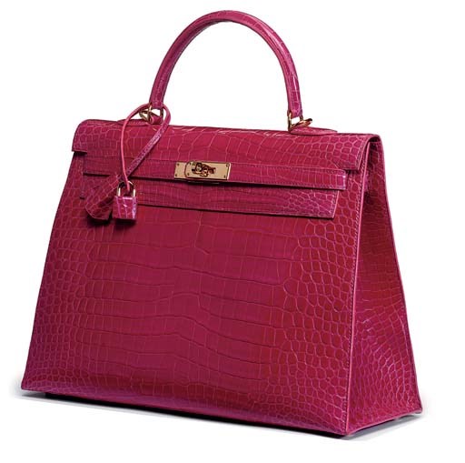 A FUSCHIA CROCODILE KELLY BAG