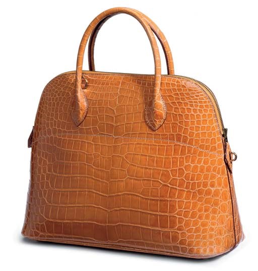A SAFFRON CROCODILE BOLIDE HANDBAG