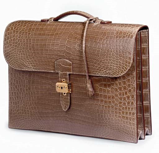 A GOLDEN SABLE CROCODILE LEATHER ATTACHÉ CASE