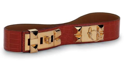 AN ORANGE CROCODILE 'MEDOR' BELT
