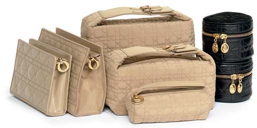 A COLLECTION OF CHRISTIAN DIOR TRAVEL BAGS