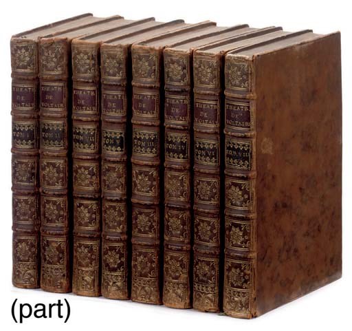 VOLTAIRE, François Marie Arouet de.  Théatre Complet. Lausanne: chez Franc. Grasset, 1772. 8 volumes, 8°. Half titles. Contemporary calf, spines gilt with red and blue lettering-pieces. Bengesco 314.  With 2 other theatrical works in 7 vols. including Mme de Gentis's Théatre d' Education ... nouvelle édition (Paris, 1829, 5 vols.) bound in calf gilt. 	 (15)
