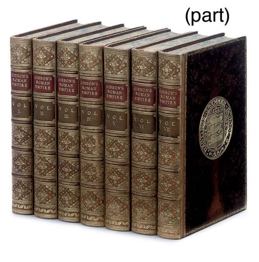 GIBBON, Edward.  The History of the Decline and Fall of the Roman Empire. London: Methuen & Co., [1909]. 7 volumes, 8°. Folding maps and plans, some coloured. Contemporary polished prize calf gilt, spines gilt in compartments with red and green lettering-pieces. Provenance: J. E. Jukes (Hastings Grammar School prize slip) -- armorial on covers. 	 (7)