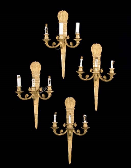 SUITE DE QUATRE APPLIQUES DE STYLE EMPIRE