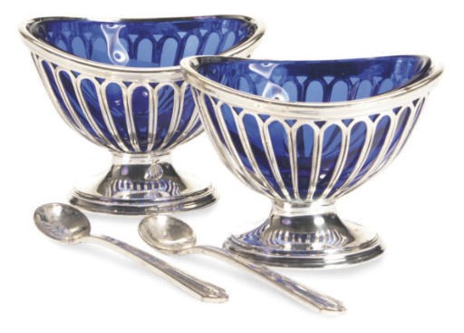 A GROUP OF SILVER-PLATED SALT CELLARS, SALT SPOONS AND CASTERS,
