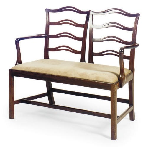 AN ENGLISH MAHOGANY SETTEE,