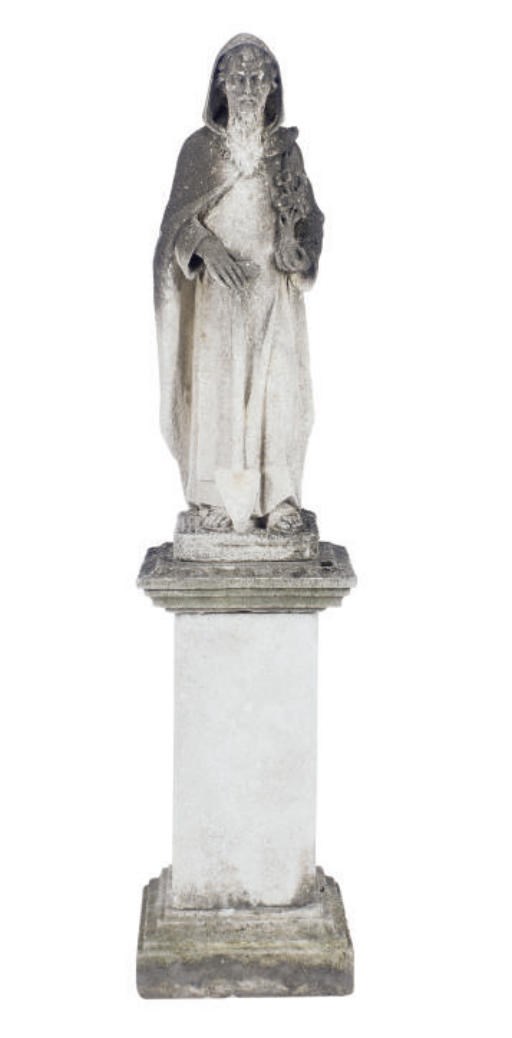 A STONE FIGURE OF A SAINT,