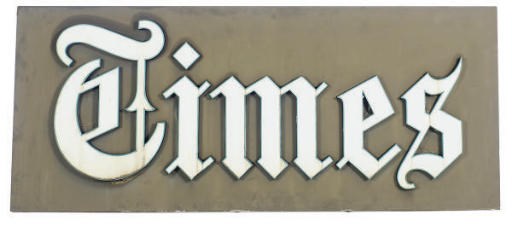 A PLASTIC AND ENAMELED METAL 'TIMES' SIGN,