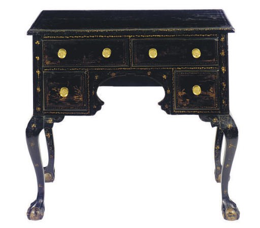 AN ENGLISH BLACK AND GILT JAPANNED DRESSING TABLE,
