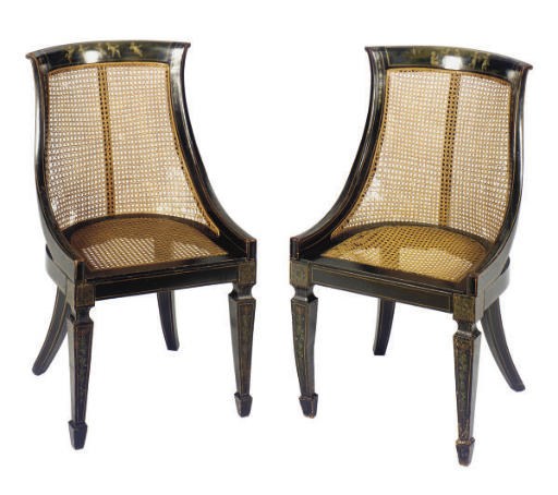 A PAIR OF ENGLISH PARCEL-GILT AND GRISAILLE DECORATED EBONIZED SIDE CHAIRS,