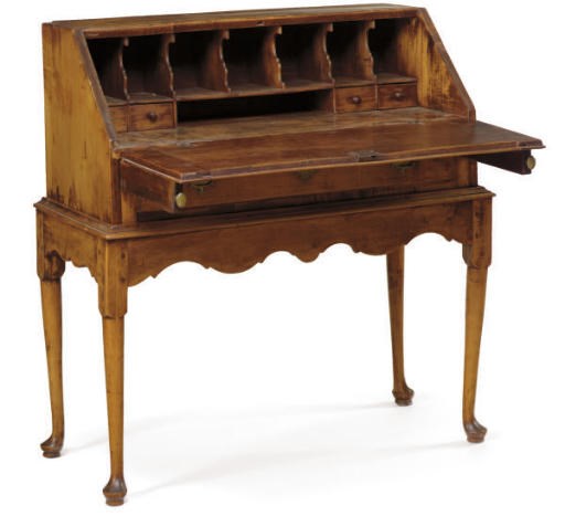 A QUEEN ANNE FIGURED MAPLE DESK-ON-FRAME