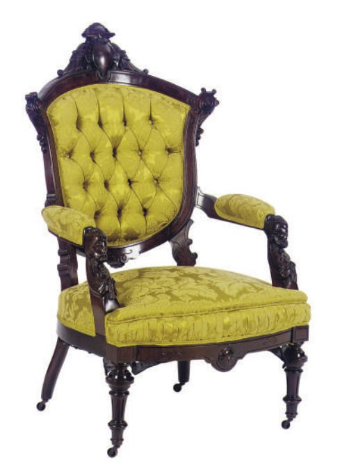 AN AMERICAN MAHOGANY AND WALNUT ARMCHAIR,
