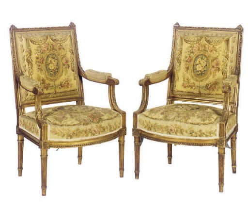 A PAIR OF FRENCH CARVED GILTWOOD FAUTEUILS WITH AUBUSSON TAPESTRY UPHOLSTERY,