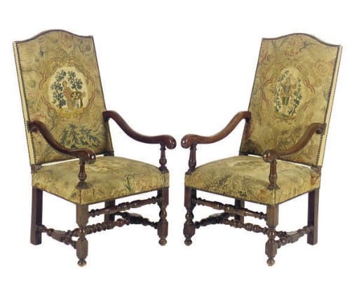 A PAIR OF FRANCO-FLEMISH WALNUT OPEN ARMCHAIRS,