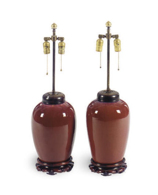 A PAIR OF BLOOD RED GLAZED PORCELAIN LAMPS,