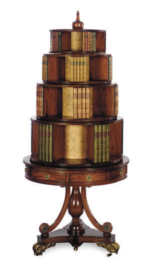 A MAHOGANY REVOLVING LIBRARY BOOKCASE,