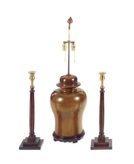 A PAIR OF TURNED WALNUT CANDLESTICKS,
