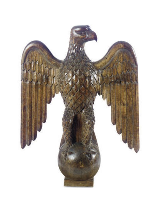 A CARVED HARDWOOD EAGLE,
