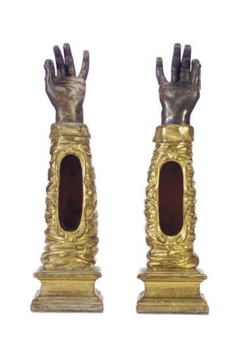 A PAIR OF ITALIAN PARCEL-GILT AND PAINTED ARM-FORM RELIQUARIES,