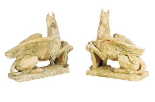 A PAIR OF TERRACOTTA GRIFFIN FIGURES,