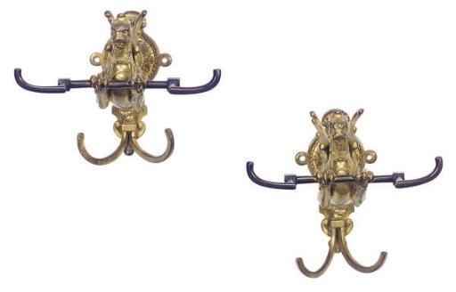 A SET OF FOUR GILT-BRONZE DRAGON-FORM WALL HOOKS,
