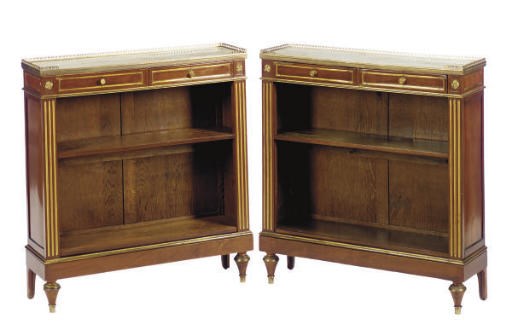 A PAIR OF FRENCH MAHOGANY SIDE CABINETS WITH MARBLE TOPS,