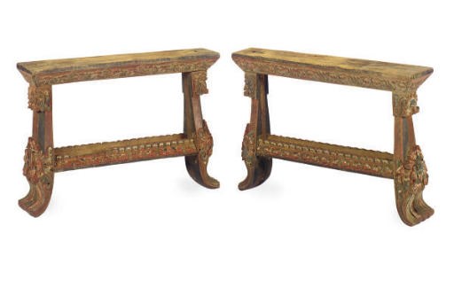 A PAIR OF INDONESIAN CARVED HARDWOOD AND POLYCHROME PAINTED TABLE STANDS,