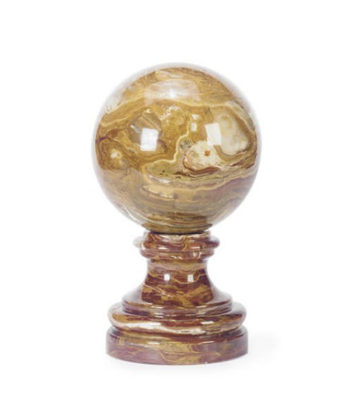A JASPER SPHERE ON PEDESTAL,