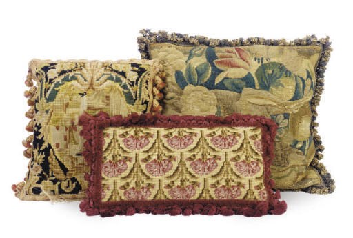 A GROUP OF SIX PILLOWS,