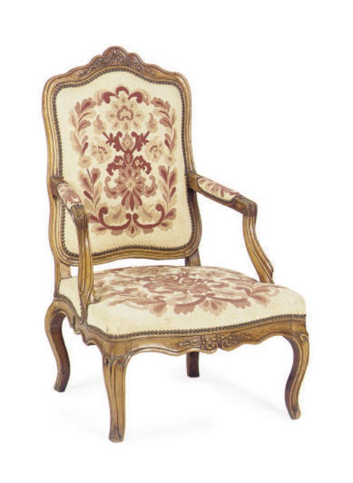 A PAIR OF FRENCH CARVED WALNUT FAUTEUILS,