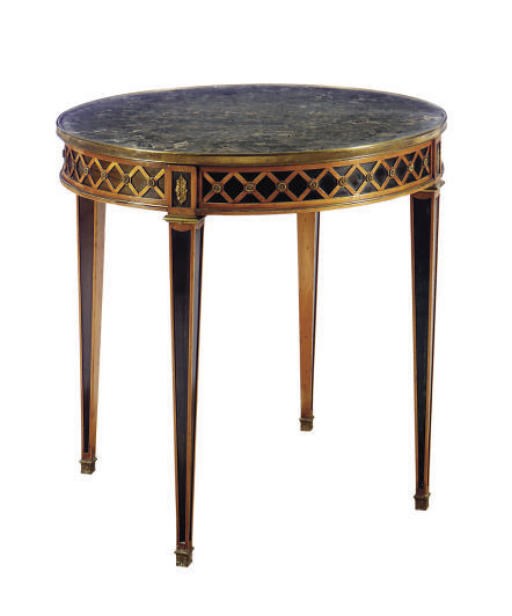 A NORTH EUROPEAN GILT-METAL MOUNTED STAINED FRUITWOOD GUERIDON,
