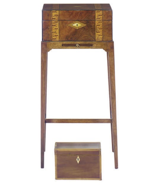 AN ENGLISH INLAID MAHOGANY WORKBOX-ON-STAND TOGETHER WITH A MAHOGANY TEA CADDY**,