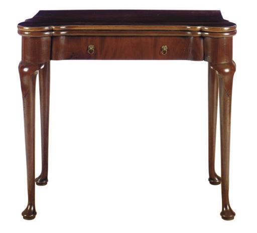 A GEORGE II MAHOGANY GAMES TABLE,
