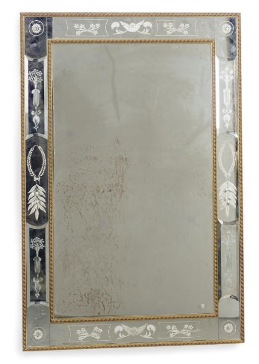 AN ETCHED GLASS GILTWOOD FRAMED WALL MIRROR,