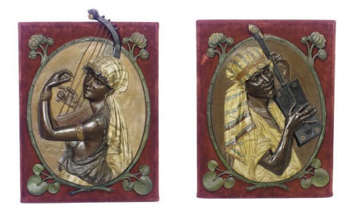 A PAIR OF PATINATED AND POLYCHROME-PAINTED METAL PLAQUES,