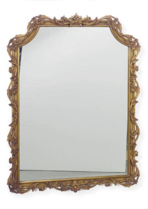 A GILT COMPOSITION OVERMANTLE MIRROR,
