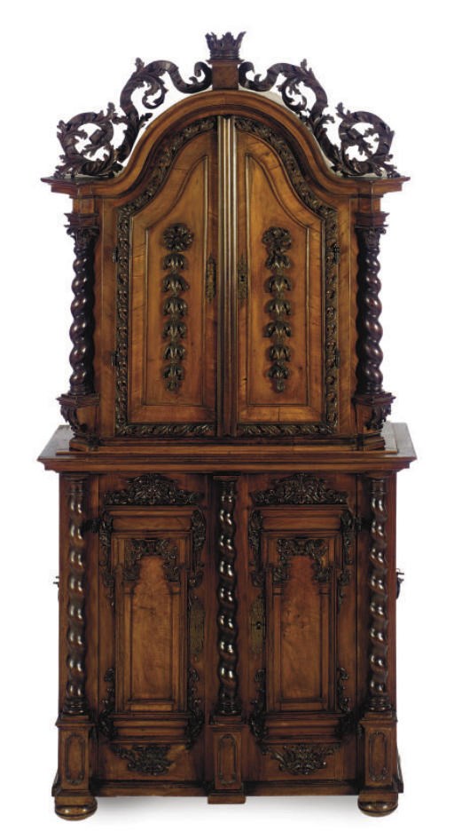 A CONTINENTAL WALNUT RENAISSANCE REVIVAL CABINET-ON-CABINET