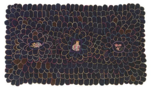 A COTTON AND WOOL NEEDLEPOINT PENNY RUG,