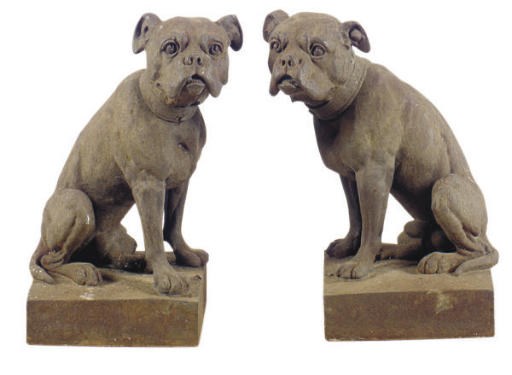 A PAIR OF CAST IRON BULL DOGS,