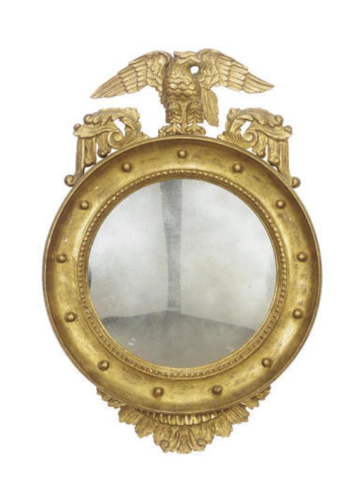 A GILTWOOD CONVEX MIRROR,