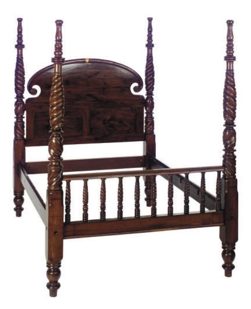 A CARVED MAHOGANY FOUR-POSTER BED,