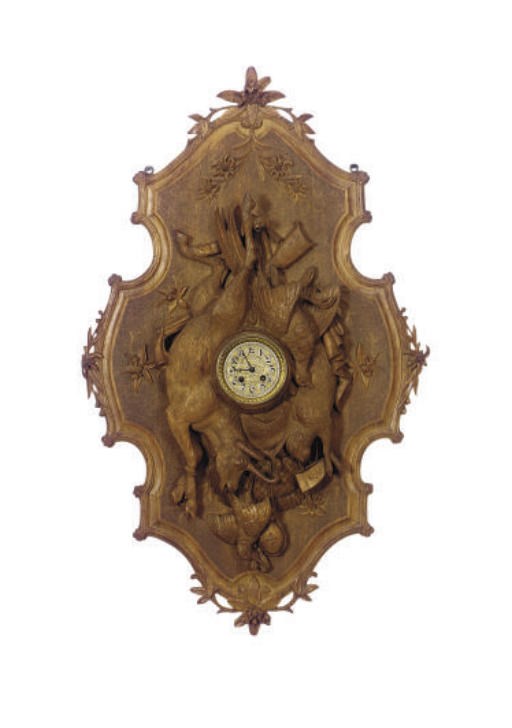 A BLACK FOREST CARVED FRUITWOOD WALL CLOCK,