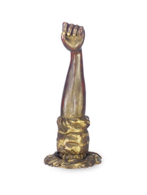 A GILTWOOD AND POLYCHROME PAINTED FIGURE OF AN ARM,