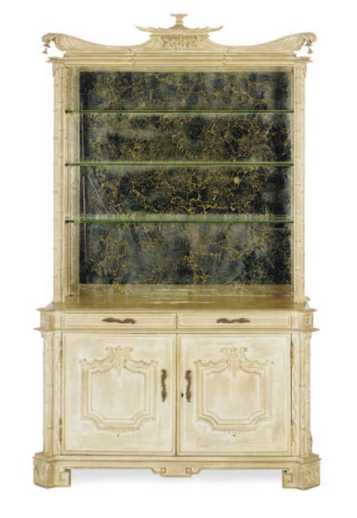 A PAGODA FORM LIMED MAHOGANY MIRRORED BACK OPEN BOOKCASE-CABINET,