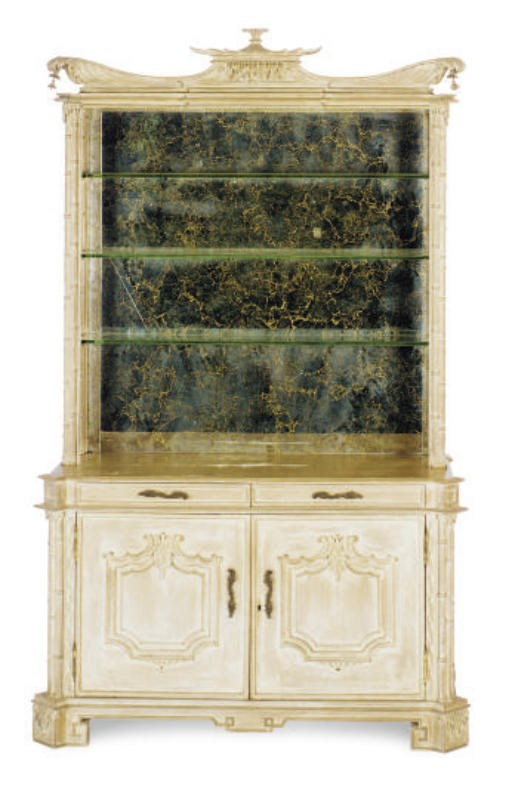 A PAGODA SHAPED LIMED MAHOGANY MIRRORED BACK OPEN BOOK-CASE CABINET,